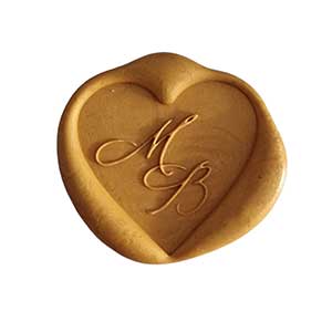 Przykład monogramu ślubnego na pieczęci w kształcie serca 